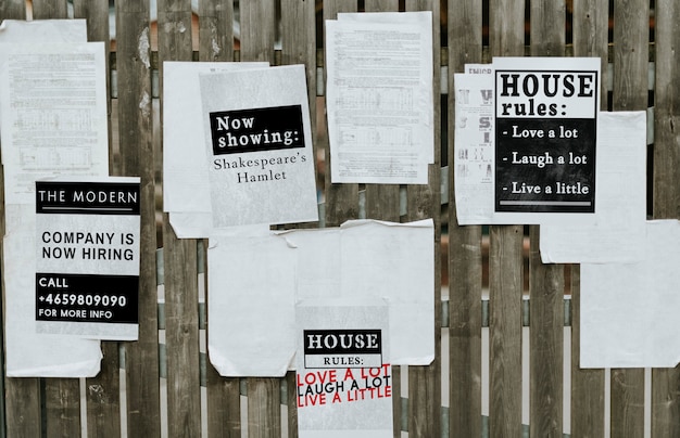 Sheets of Paper Ads on a Wooden Fence – Free Stock Photo Download