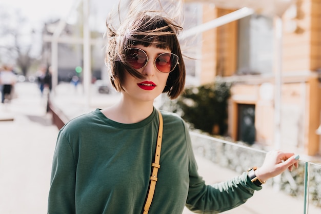 Good-looking Young Woman in Sunglasses Enjoying a Spring Day in the City – Free Stock Photo for Download