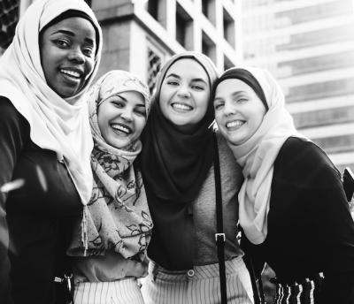 Islamic Friends Embracing and Smiling Together – Free Download