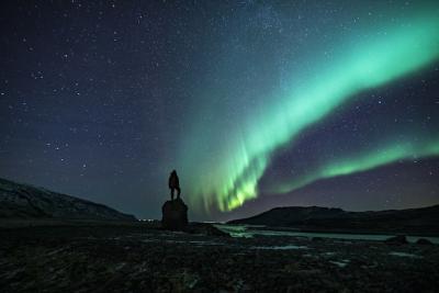 Silhouette of a Person Beneath Stunning Northern Lights – Free Stock Photo, Download for Free