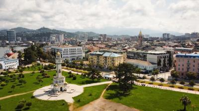 Aerial Drone View of Batumi, Georgia: A Stunning Blend of Old and Modern Architecture Surrounded by Nature – Free Download