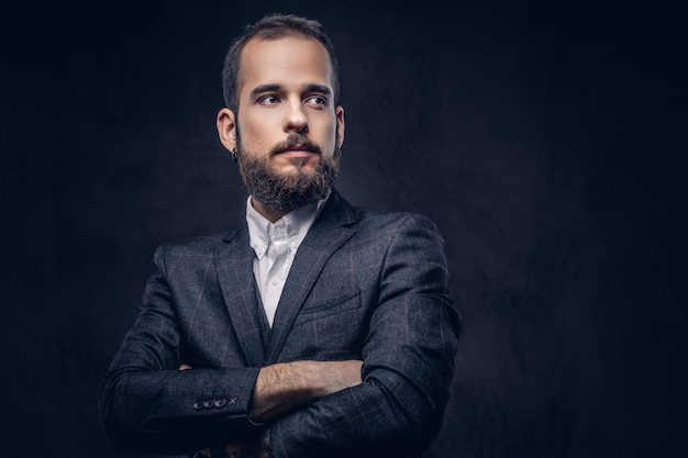 Handsome Bearded Male in Elegant Suit Against Dark Background – Free Stock Photo, Download for Free