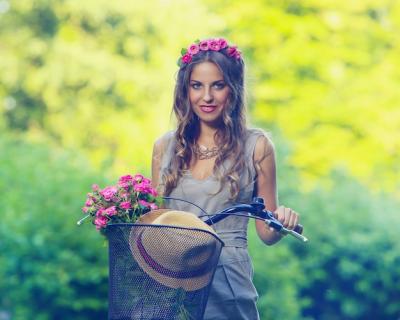 Beautiful Girl with Flowers on a Bike – Free Stock Photo for Download