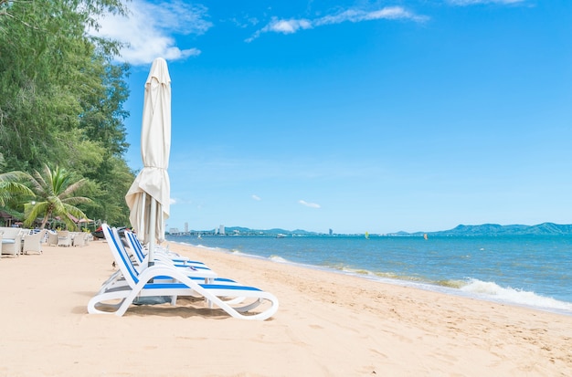 Beautiful Tropical Beach with Umbrella and Chair – Free Stock Photo for Download