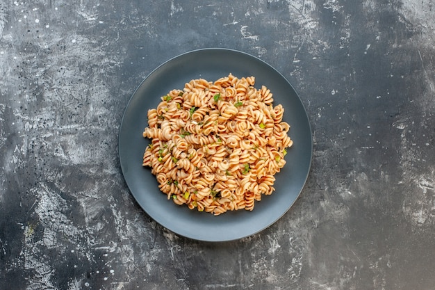 Top View Rotini Pasta on Round Plate for Free Download