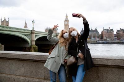 Tourists Exploring the City in Travel Masks – Free Download