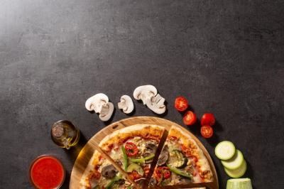 Vegetarian Pizza Featuring Zucchini, Tomato, Peppers, and Mushrooms – Free Download