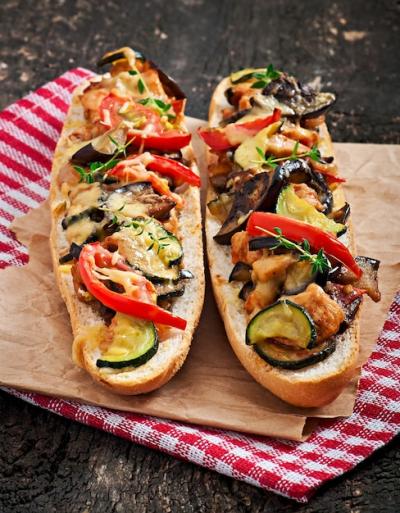 Big Sandwich with Roasted Vegetables and Cheese on a Rustic Wooden Background – Free Download