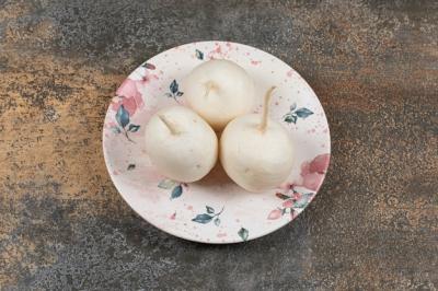 Three Radishes on a Plate Against a Marble Surface – Free Download