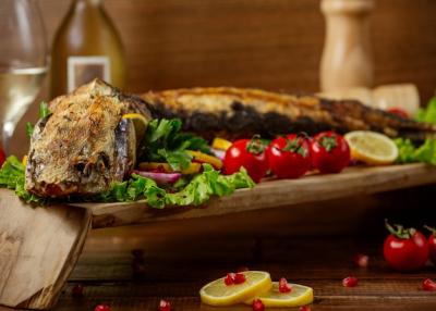 Fried Fish with Vegetables on the Table – Free Stock Photo for Download