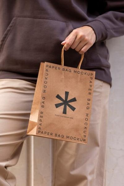 Woman Holding Shopping Bag Outdoors – Free Download