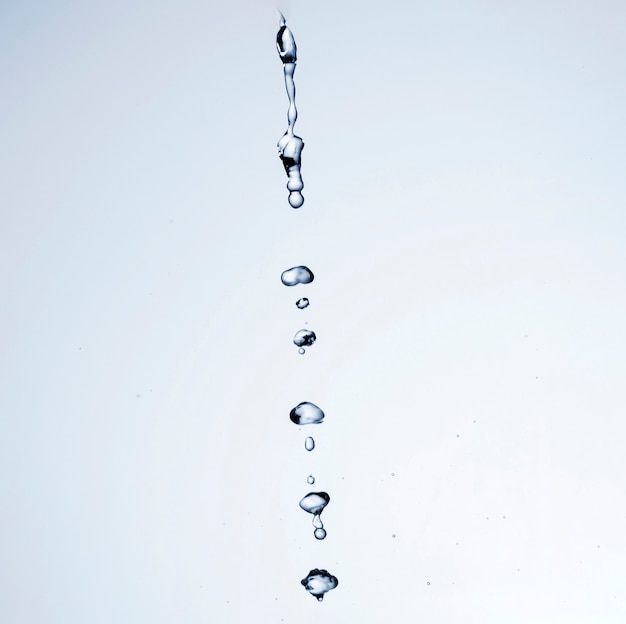 Transparent Liquid Drops on White Background – Free Stock Photo for Instant Download