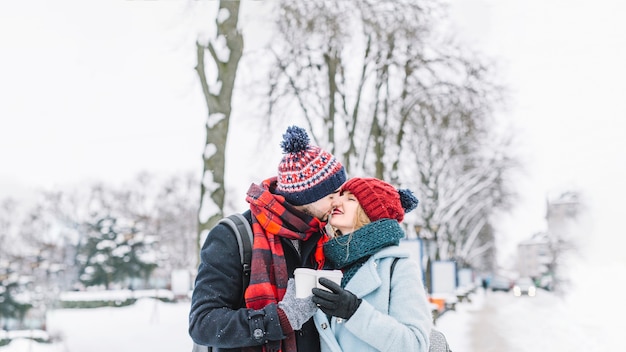 Kissing Tender Couple on Street – Free Stock Photo for Download