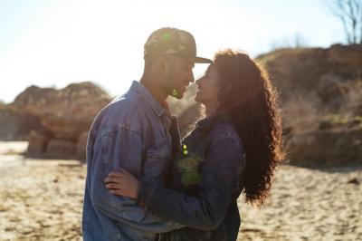 Happy African Couple Embracing at the Beach – Free Download