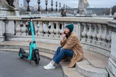 Person Riding an Electric Scooter in the City – Free Stock Photo for Download