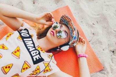 Attractive Woman on Beach with Headphones and Colorful Outfit â Free Download