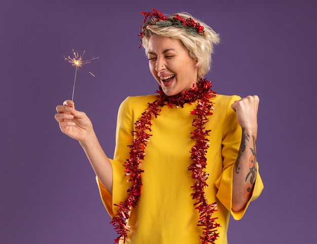 Joyful Young Woman with Christmas Accessories and Sparkler – Free Stock Photo for Download