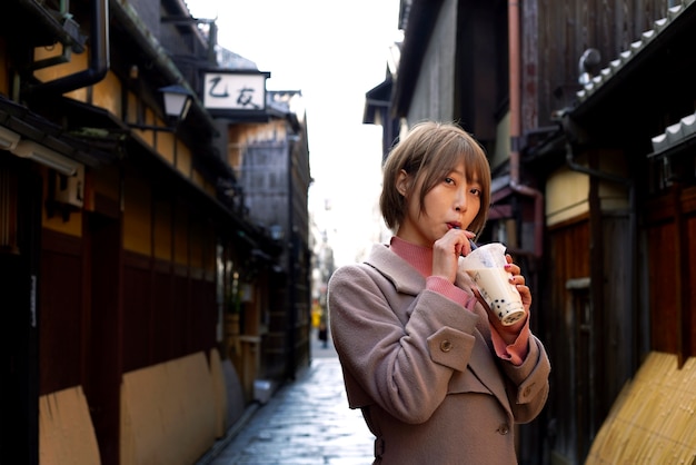 Young Woman Enjoying Bubble Tea – Free Download