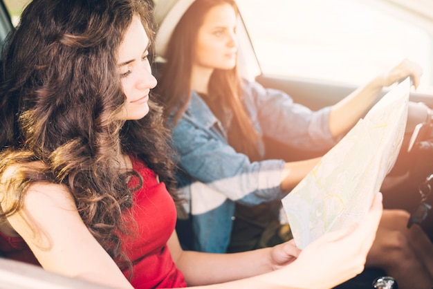 Young Women Driving Car with Map – Free Stock Photo, Download Free