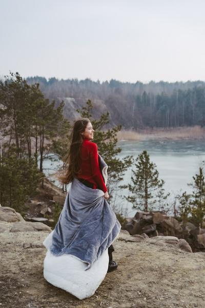 Stunning Portrait of a Young Beautiful Woman by a Lake – Free to Download