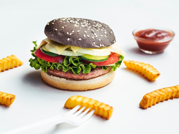 Black Burger with French Fries – Download Free Stock Photo