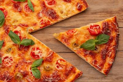 Delicious Top View Pizza on Wooden Background – Free Download