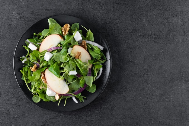 Autumn Salad with Apples and Walnuts on Black Slate Background – Free Download