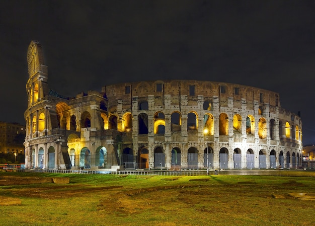 Colosseum Night View: A Symbol of Imperial Rome, Italy – Free Download