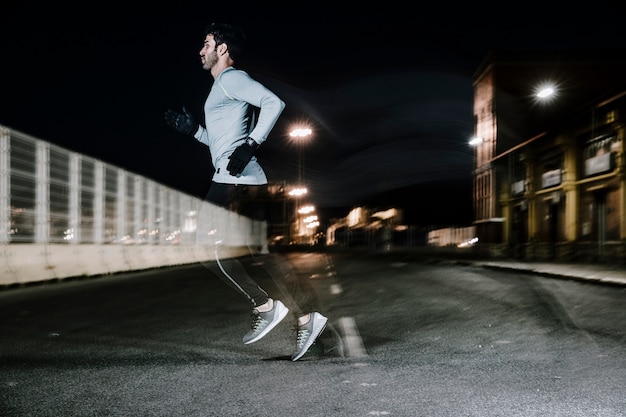 Dynamic Running Scene in the Dark – Free Stock Photo for Download