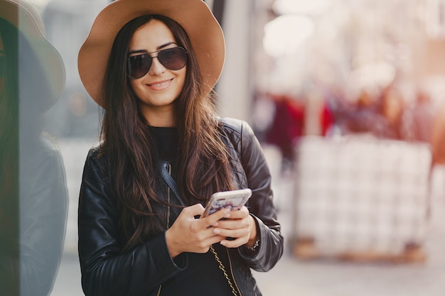 Girl Holding Phone in Istanbul – Free Stock Photo for Download