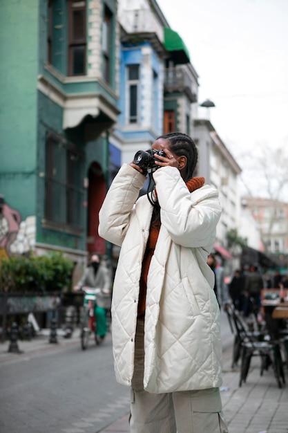 Female Tourist Photographer Capturing Moments Outdoors – Free Stock Photo, Download Free