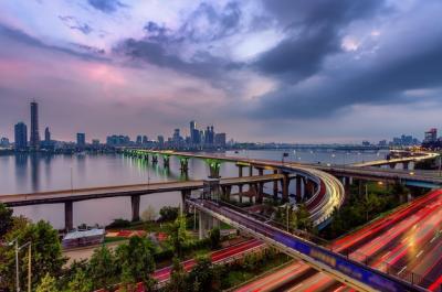 Illuminated Bridges and Buildings Against Cloudy Sky – Free Stock Photo, Download Free