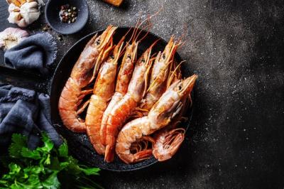 Giant Shrimps on Dark Table – Free Stock Photo for Download