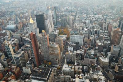 Stunning Aerial View of Manhattan Skyline at Sunset – Free Download