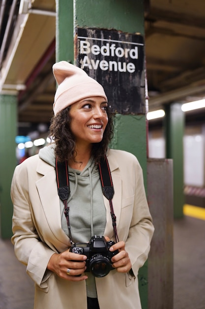 Young Stylish Female Photographer in the City Subway – Free Stock Photo for Download