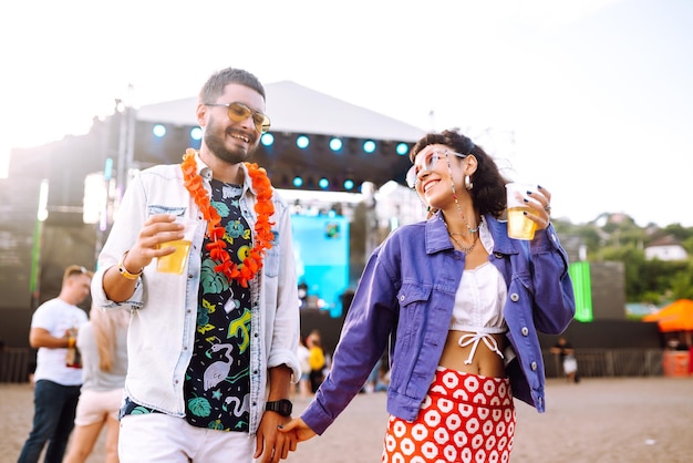 Couple Enjoying Beer at a Summer Music Festival: Free Stock Photo Download