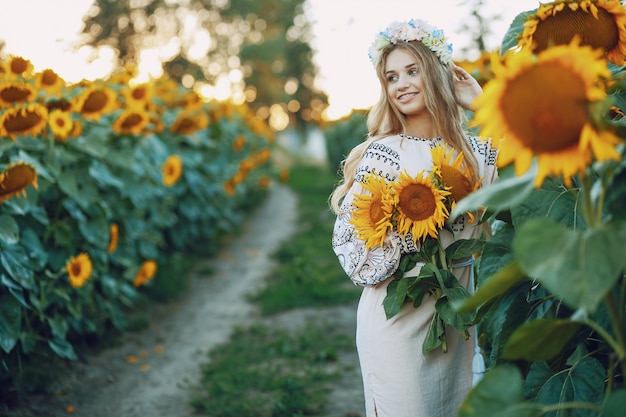 Girl Surrounded by Sunflowers – Free Download