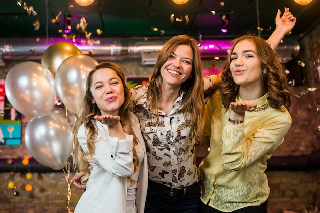 Pretty Girls Posing and Smiling in a Nightclub – Free Stock Photo Download