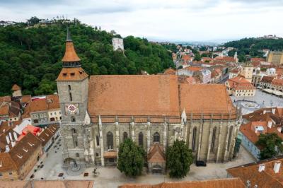 Aerial Drone View of The Black Church in Old Brasov, Romania – Free Download