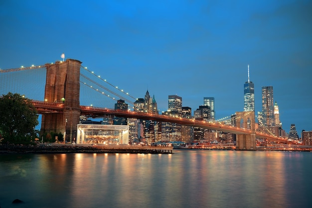 Manhattan Downtown Urban View with Brooklyn Bridge at Night – Free Download