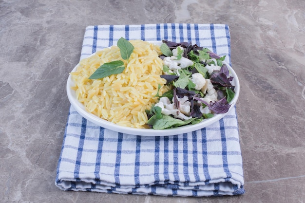 Platter of Rice Pilau with Amaranth, Basil, and Cauliflower Salad on Marble Surface – Free Stock Photo for Download