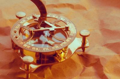 Antique Compass on Vintage Paper Background – Free Stock Photo for Download