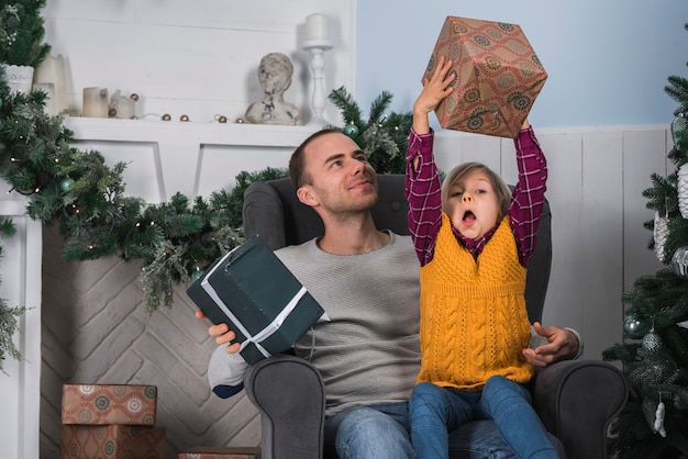 Christmas Celebrations with Father and Joyful Kid – Free Stock Photo, Download Free