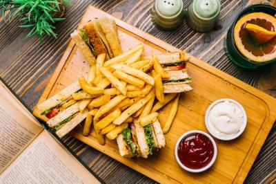 Club Sandwich with Chicken, Tomato, Cucumber, and French Fries – Download Free Stock Photo