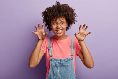 Dark Skinned Female Growling Like a Tiger – Free Stock Photo, Download for Free