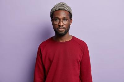 African American Guy in Red Shirt and Trendy Hat – Free Download