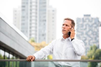 Businessman Discussing Over the Phone – Free Download