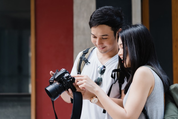 Asian Couple Taking Pictures on Holiday in Beijing, China – Free to Download