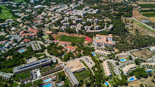 Aerial View of Algarve’s Coastal Village in Portugal – Summer Vacation Inspiration | Free Stock Photo, Download for Free