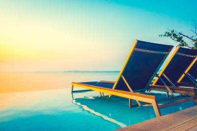 Blue Tropical Hotel Chair and Umbrella – Download Free Stock Photo